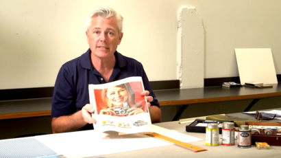 a man holding a magazine
