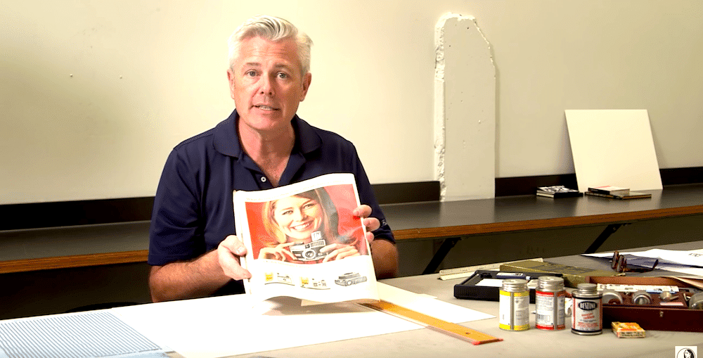 a man holding a magazine
